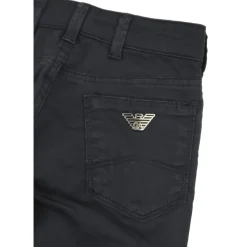 Five-pocket bukser med metallogoer